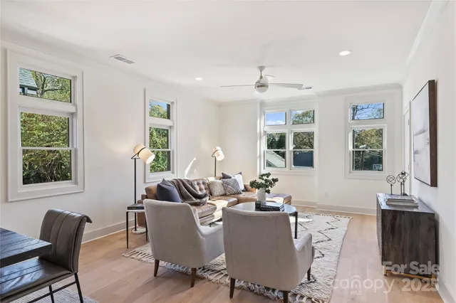 a living room with furniture and window
