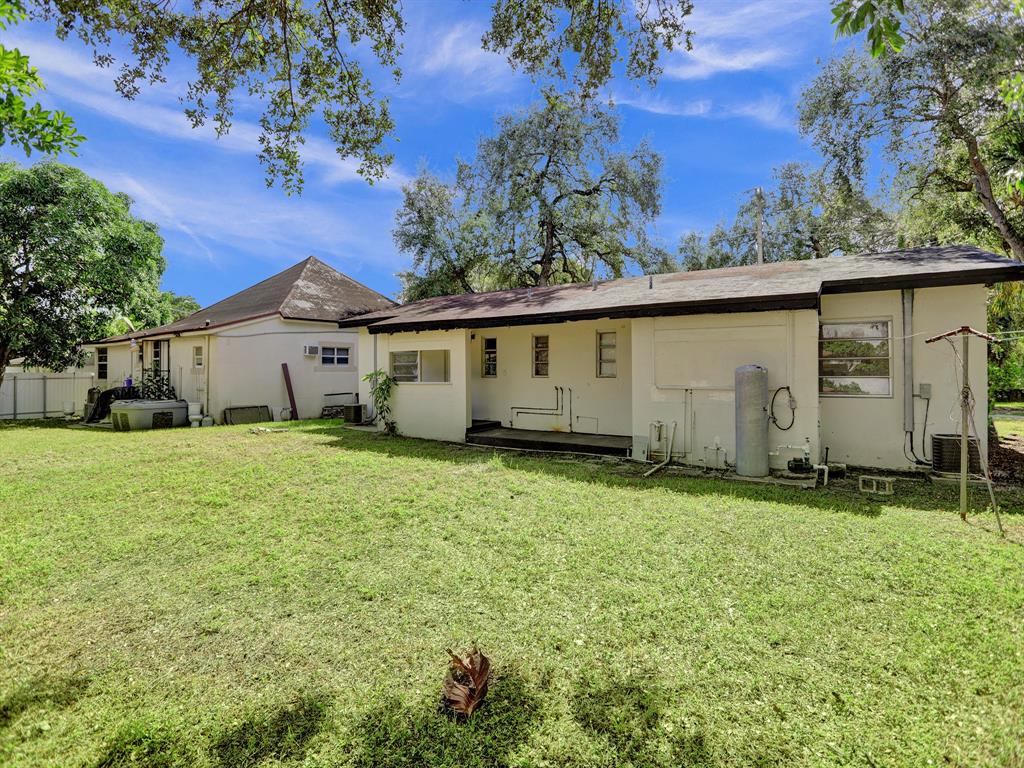 535 Northwest 91st Street, Unit 2 Miami, FL 33150 - Photo 20 of 20 a view of a house with backyard