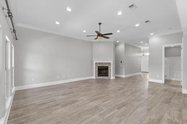 a kitchen with a sink a microwave a stove and refrigerator