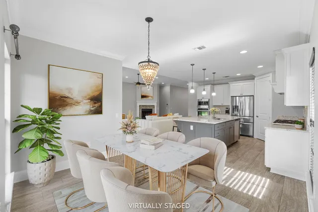 a view of hallway with wooden floor