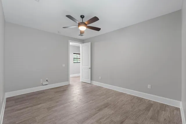 a view of a balcony with chairs