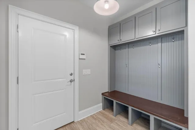 an aerial view of residential house with outdoor space and swimming pool