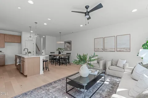 a living room with furniture and a table