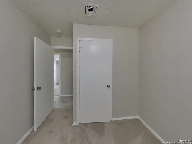 a view of a small space with a window