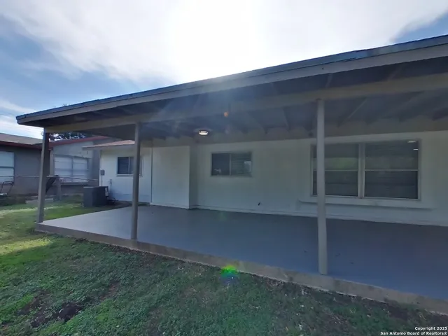 a picture of a bench in a white wall
