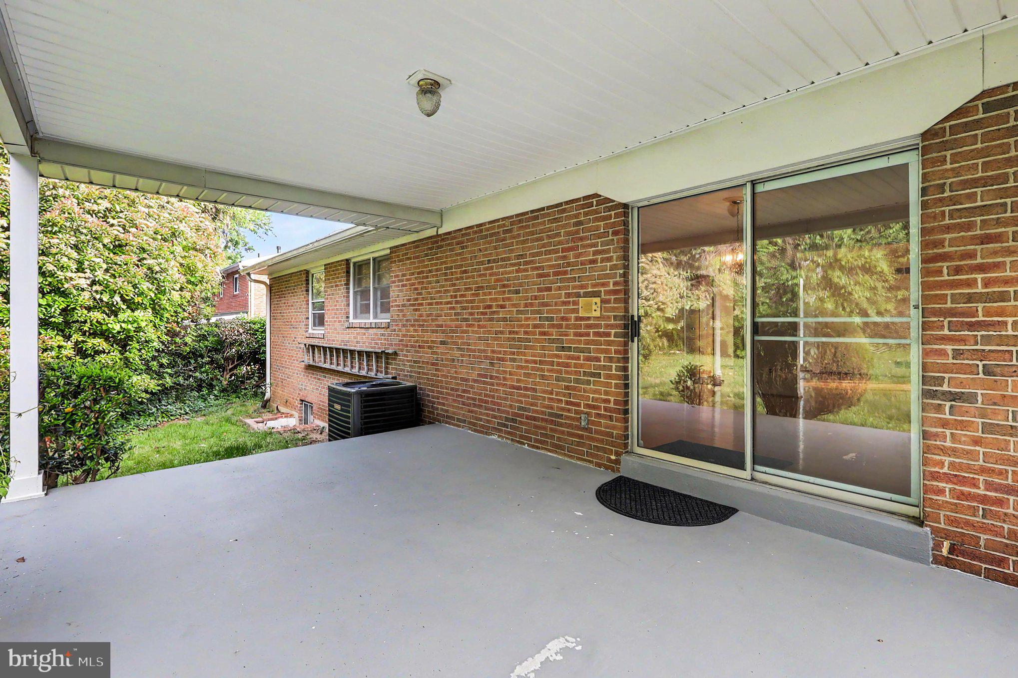 4411 Lucerne Road Temple Hills, MD 20748 - Photo 25 of 28 Covered porch off of dining area overlooking back