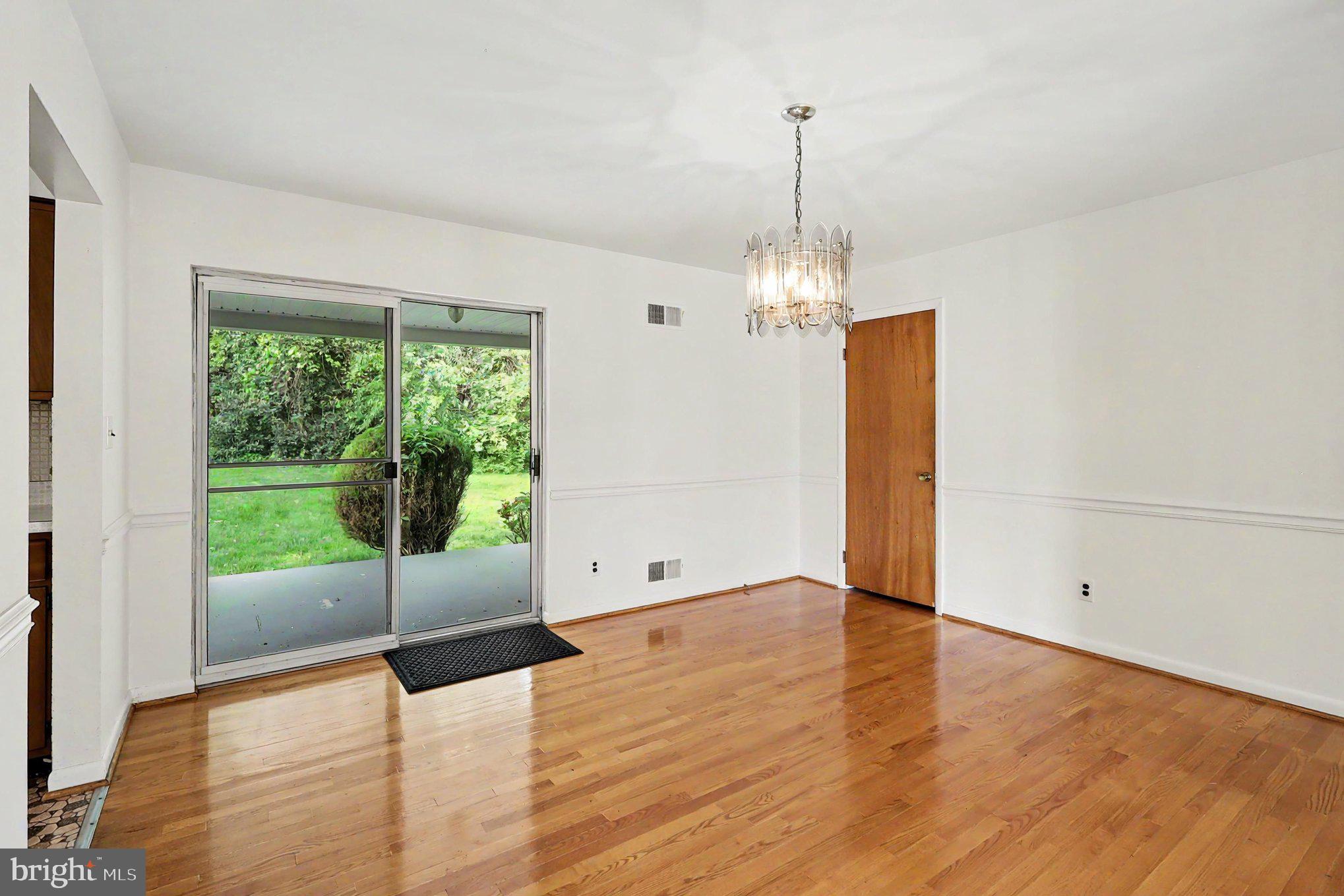 4411 Lucerne Road Temple Hills, MD 20748 - Photo 9 of 28 Dining area opens to covered porch