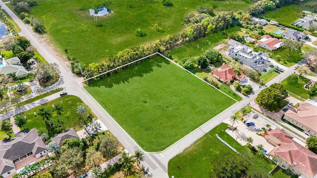 0 Stirling Road Southwest Ranches, FL 33331 - Photo 7 of 11 an aerial view of a residential houses with outdoor space and street view