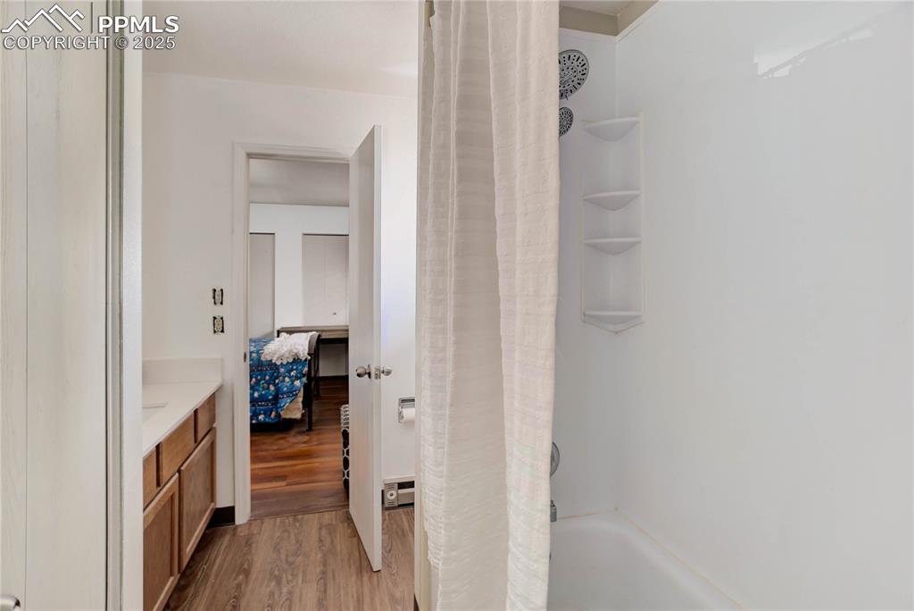 5102 Rainbow Harbour Circle Colorado Springs, CO 80917 - Photo 17 of 25 a bathroom with a tub and shower