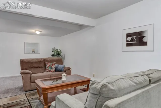 a living room with a couch and a coffee table