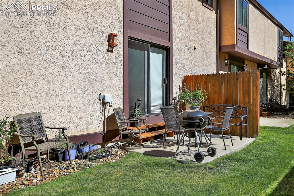 5102 Rainbow Harbour Circle Colorado Springs, CO 80917 - Photo 23 of 25 a view of backyard with wheel chair and a potted plant