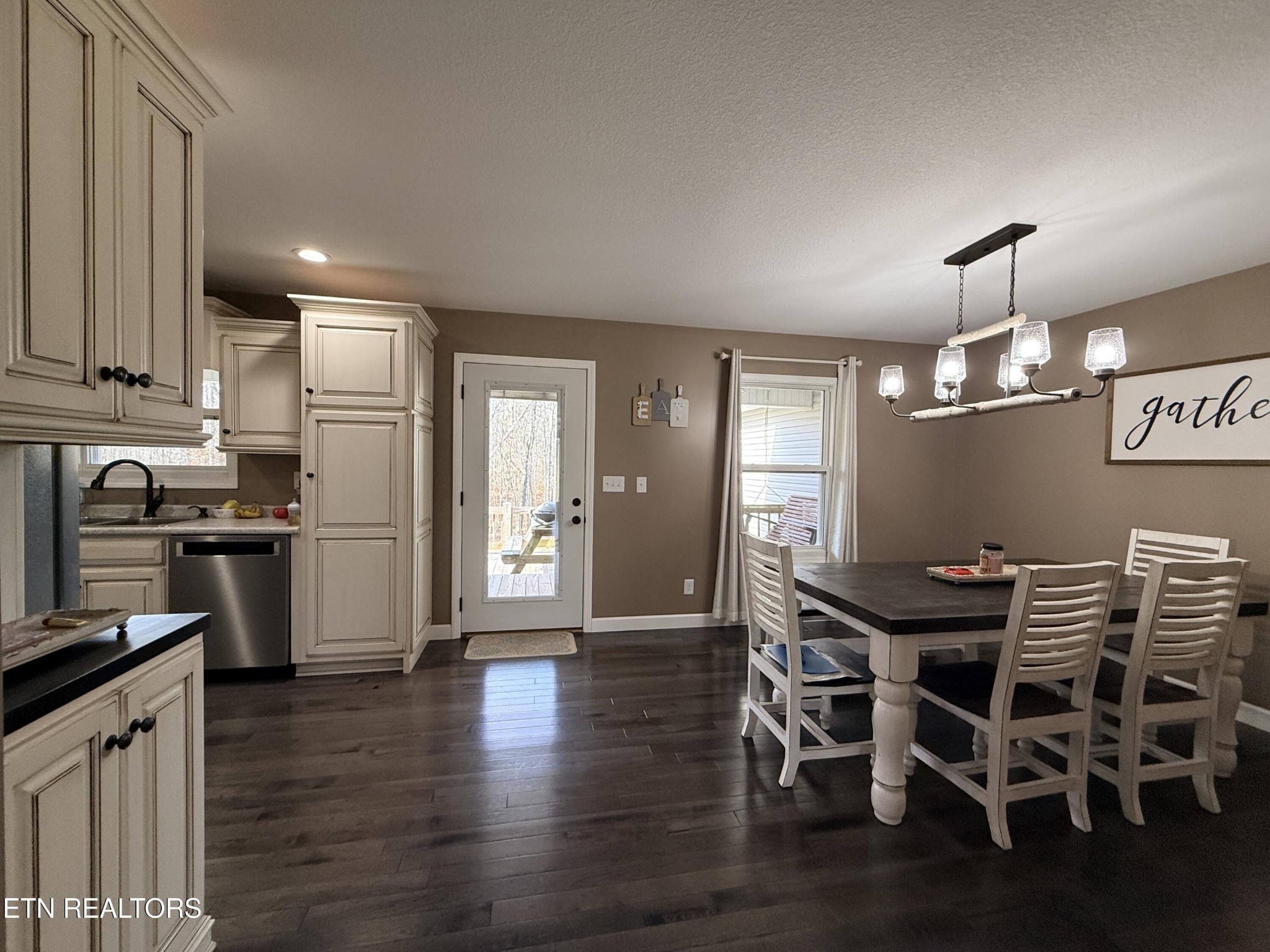 1926 Old Grimsley Road Grimsley, TN 38565 - Photo 11 of 41 a kitchen with granite countertop white cabinets and stainless steel appliances
