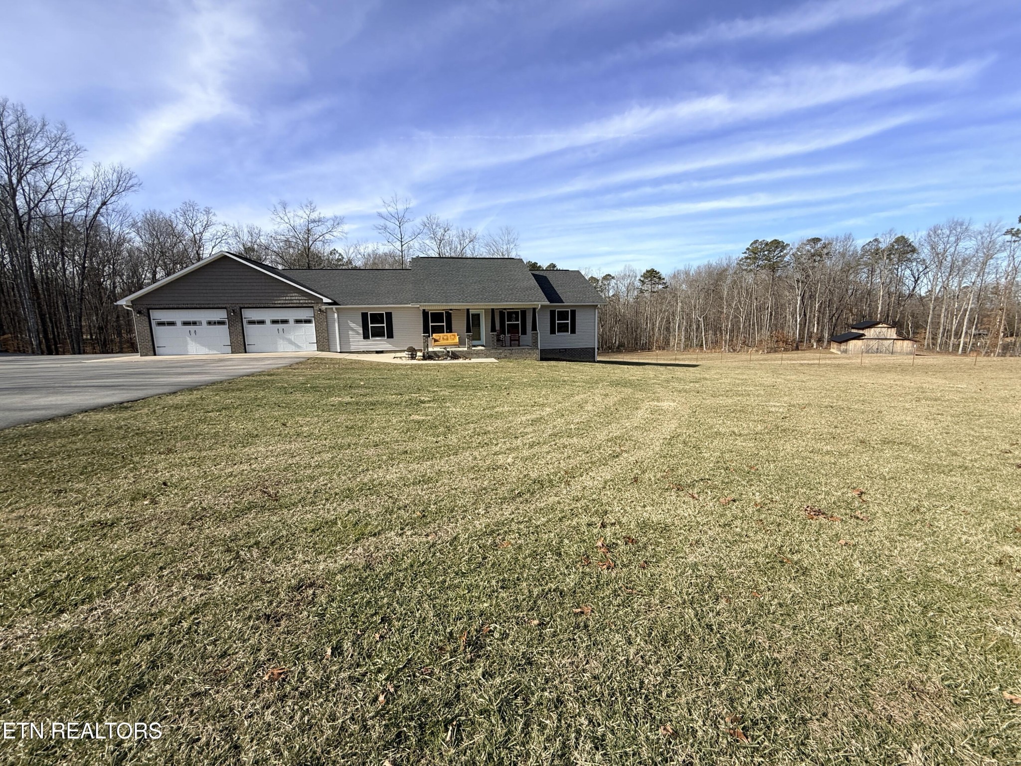1926 Old Grimsley Road Grimsley, TN 38565 - Photo 2 of 41 a front view of a house with a yard