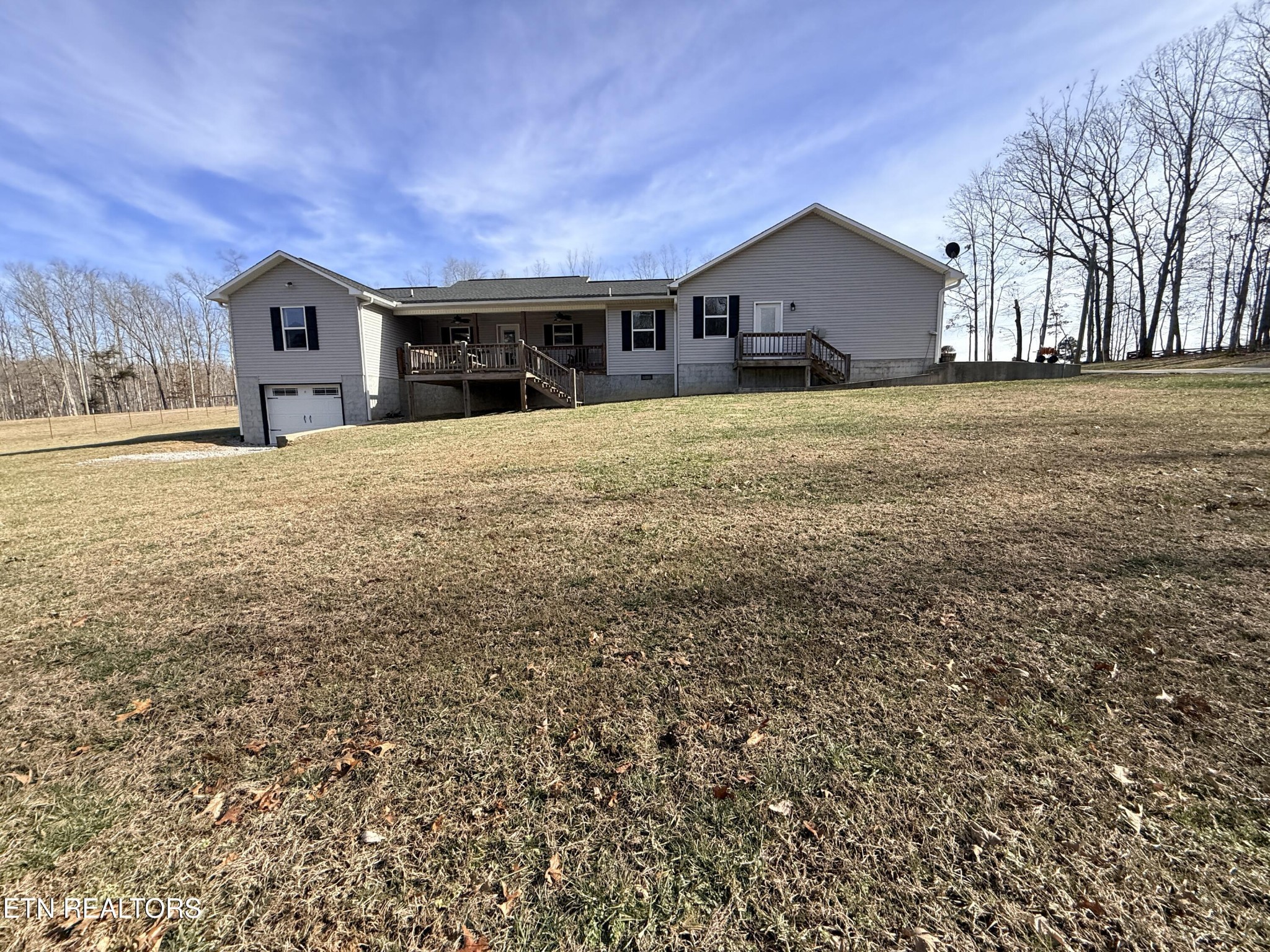1926 Old Grimsley Road Grimsley, TN 38565 - Photo 35 of 41 a front view of house with yard and trees in the background