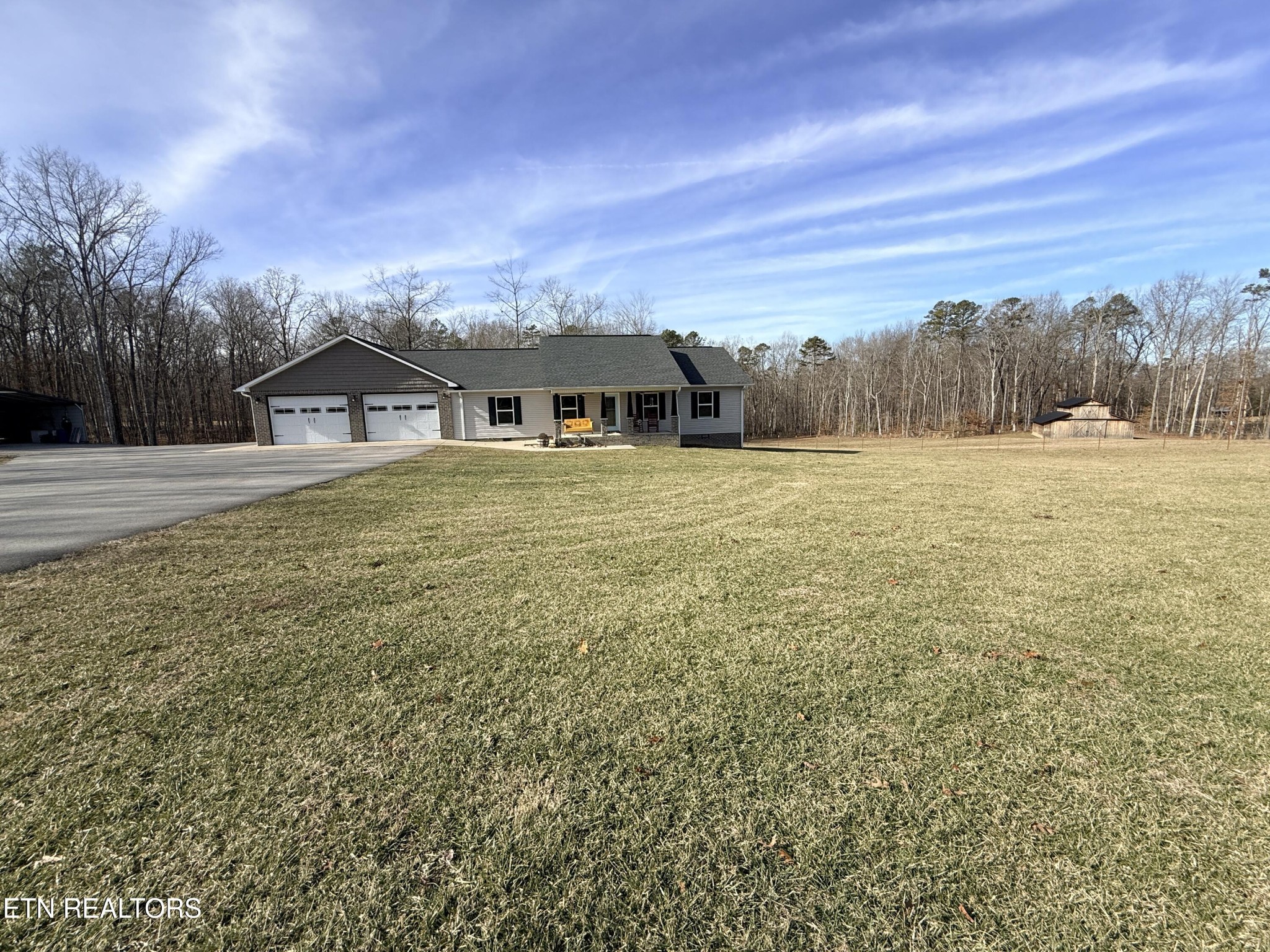 1926 Old Grimsley Road Grimsley, TN 38565 - Photo 39 of 41 a front view of house with yard and trees in the background