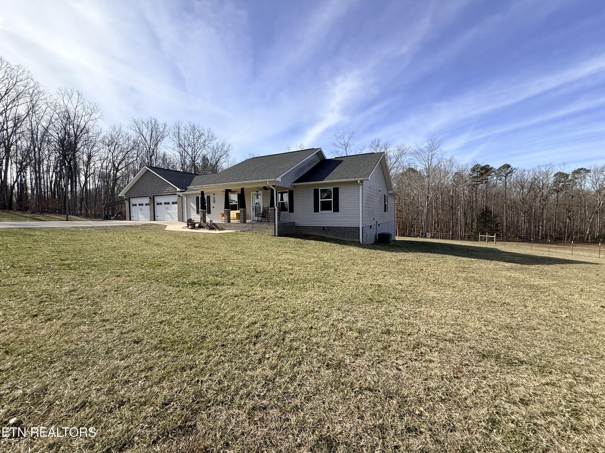 1926 Old Grimsley Road Grimsley, TN 38565 - Photo 4 of 41 a front view of a house with a yard