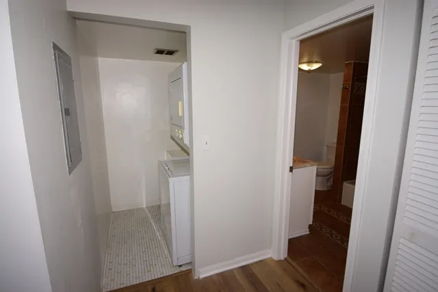 a view of a bathroom from a hallway