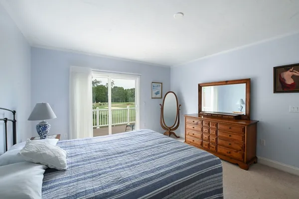a en suite bathroom with a sink mirror and vanity