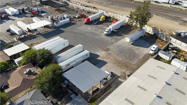 an aerial view of residential house with outdoor space