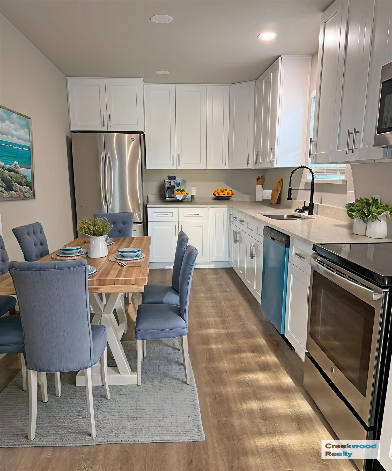 91 Willow Oak Lane Point Blank, TX 77364 - Photo 11 of 27 a view of kitchen with cabinets table and chairs