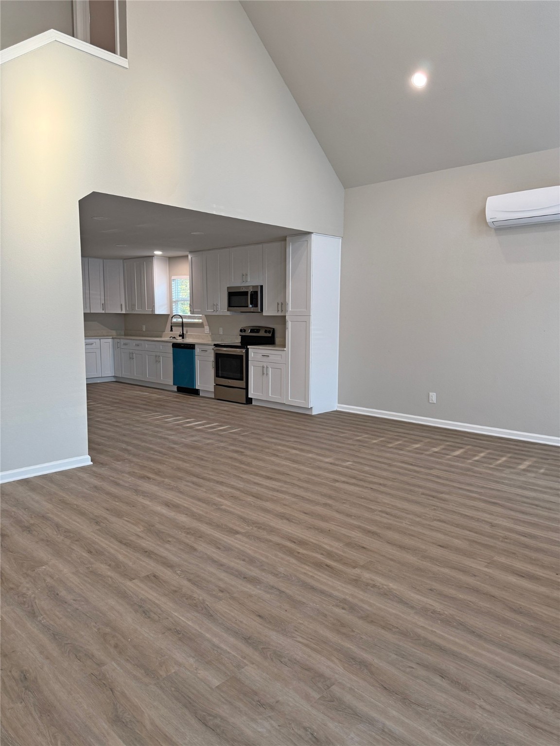 91 Willow Oak Lane Point Blank, TX 77364 - Photo 14 of 27 a view of a kitchen with microwave and cabinets