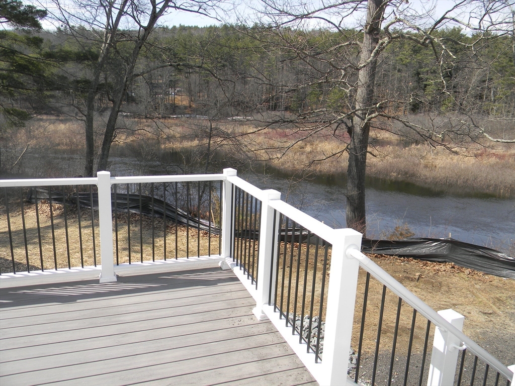 1 Lenox Street Athol, MA 01331 - Photo 12 of 37 a view of a balcony with wooden floor and fence