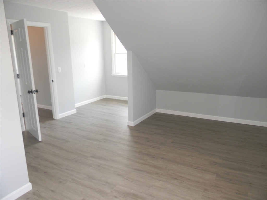 1 Lenox Street Athol, MA 01331 - Photo 24 of 37 an empty room with wooden floor and windows