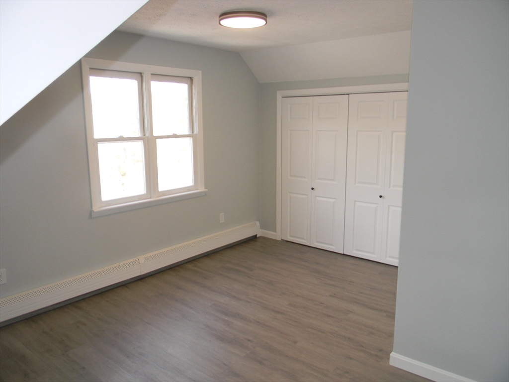 1 Lenox Street Athol, MA 01331 - Photo 25 of 37 an empty room with wooden floor and windows
