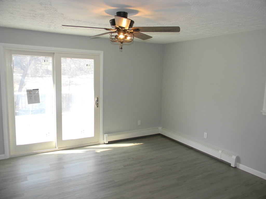 1 Lenox Street Athol, MA 01331 - Photo 9 of 37 wooden floor in an empty room with a window