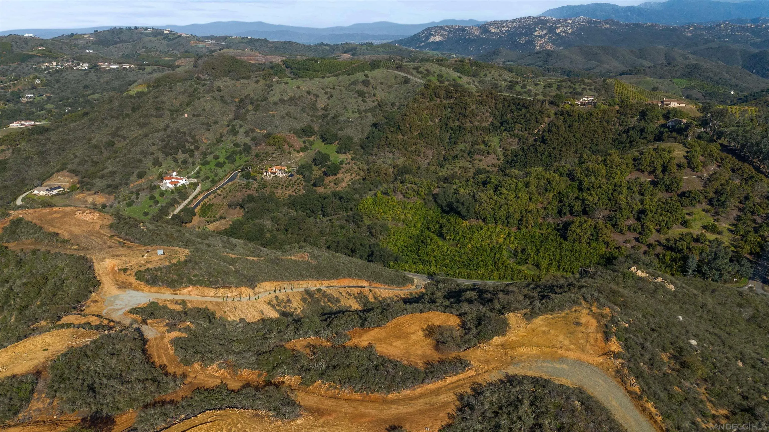 555 Calle Jardin, Unit 1 Temecula, CA 92590 - Photo 5 of 22 a view of a mountain range with lush green forest