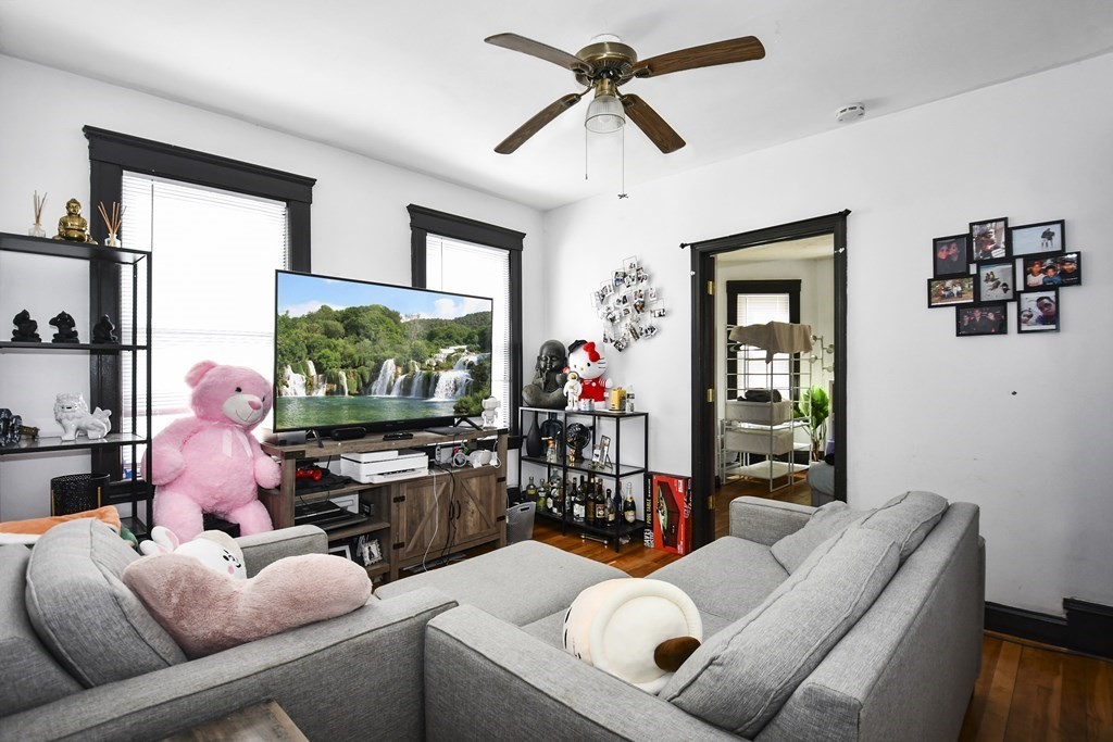 97 Arthur Street Worcester, MA 01604 - Photo 23 of 42 a living room with furniture and a flat screen tv
