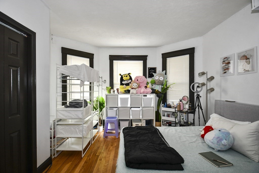 97 Arthur Street Worcester, MA 01604 - Photo 25 of 42 a living room with furniture and a window