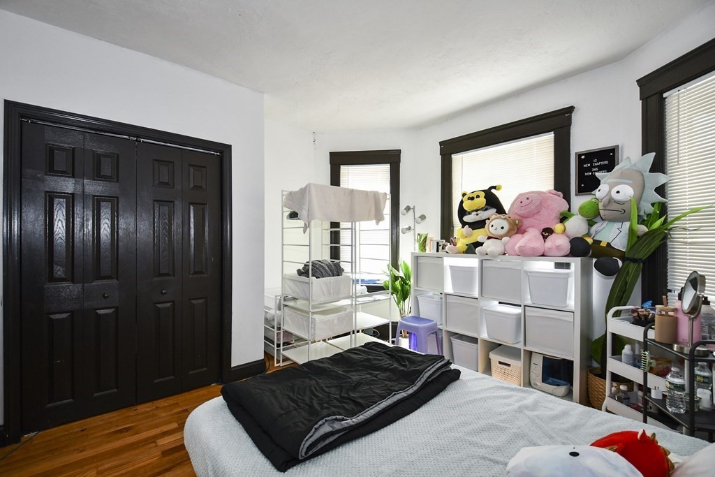 97 Arthur Street Worcester, MA 01604 - Photo 26 of 42 a living room with furniture and wooden floor