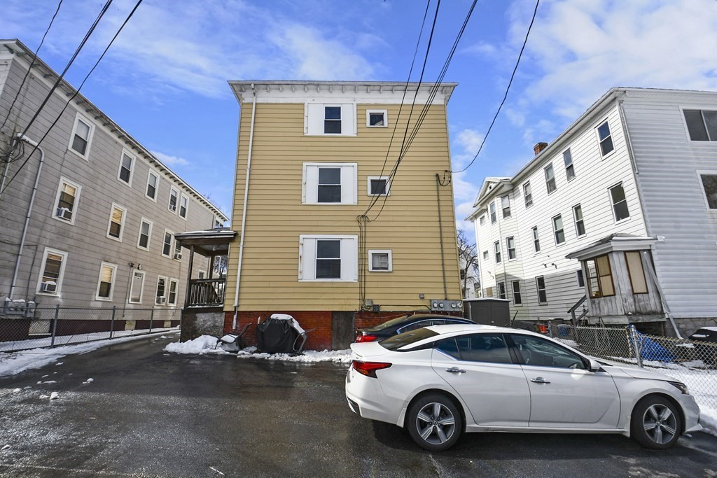 97 Arthur Street Worcester, MA 01604 - Photo 42 of 42 a view of a car parked in front of a house