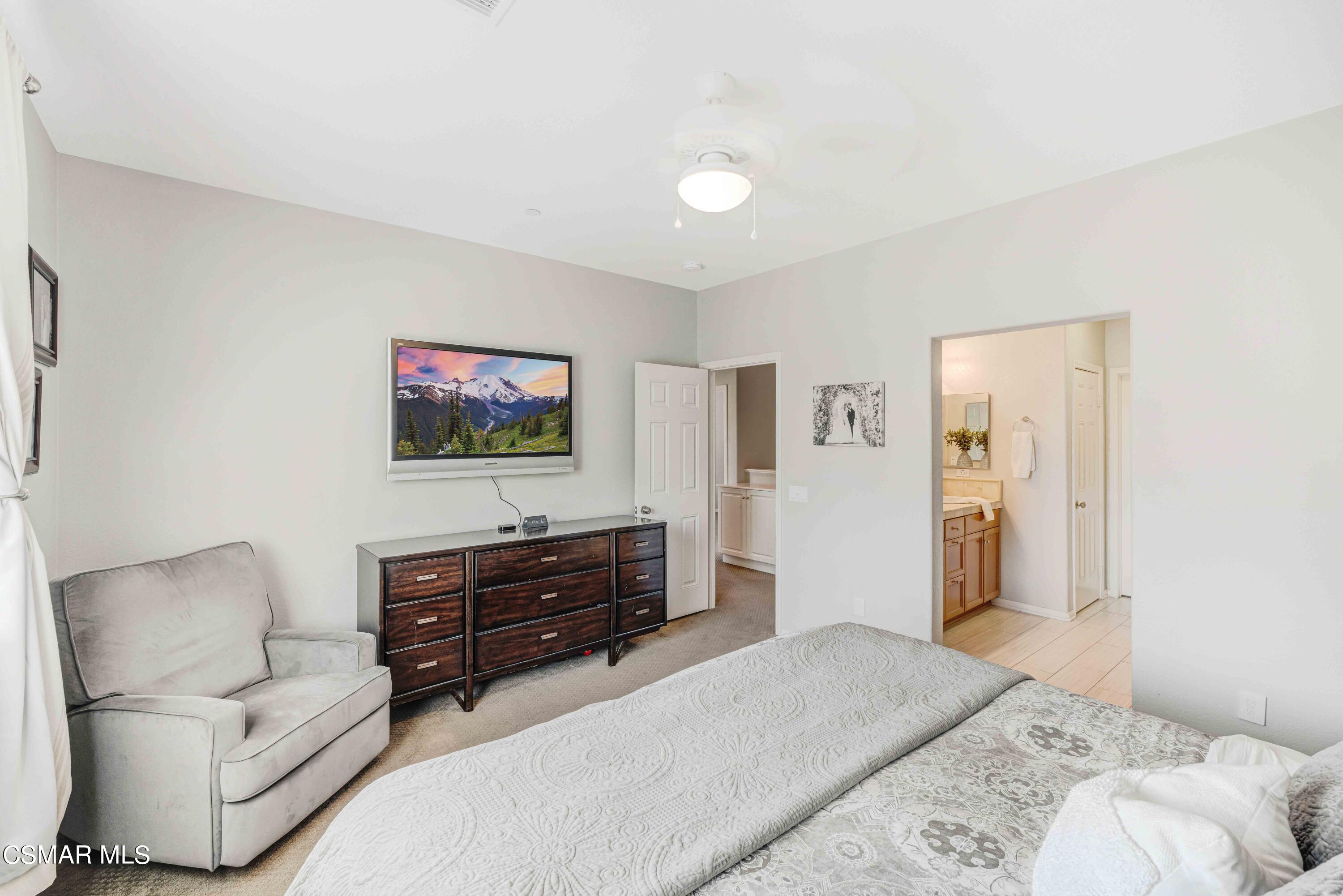 6802 Simmons Way Moorpark, CA 93021 - Photo 18 of 36 a living room with furniture and a flat screen tv