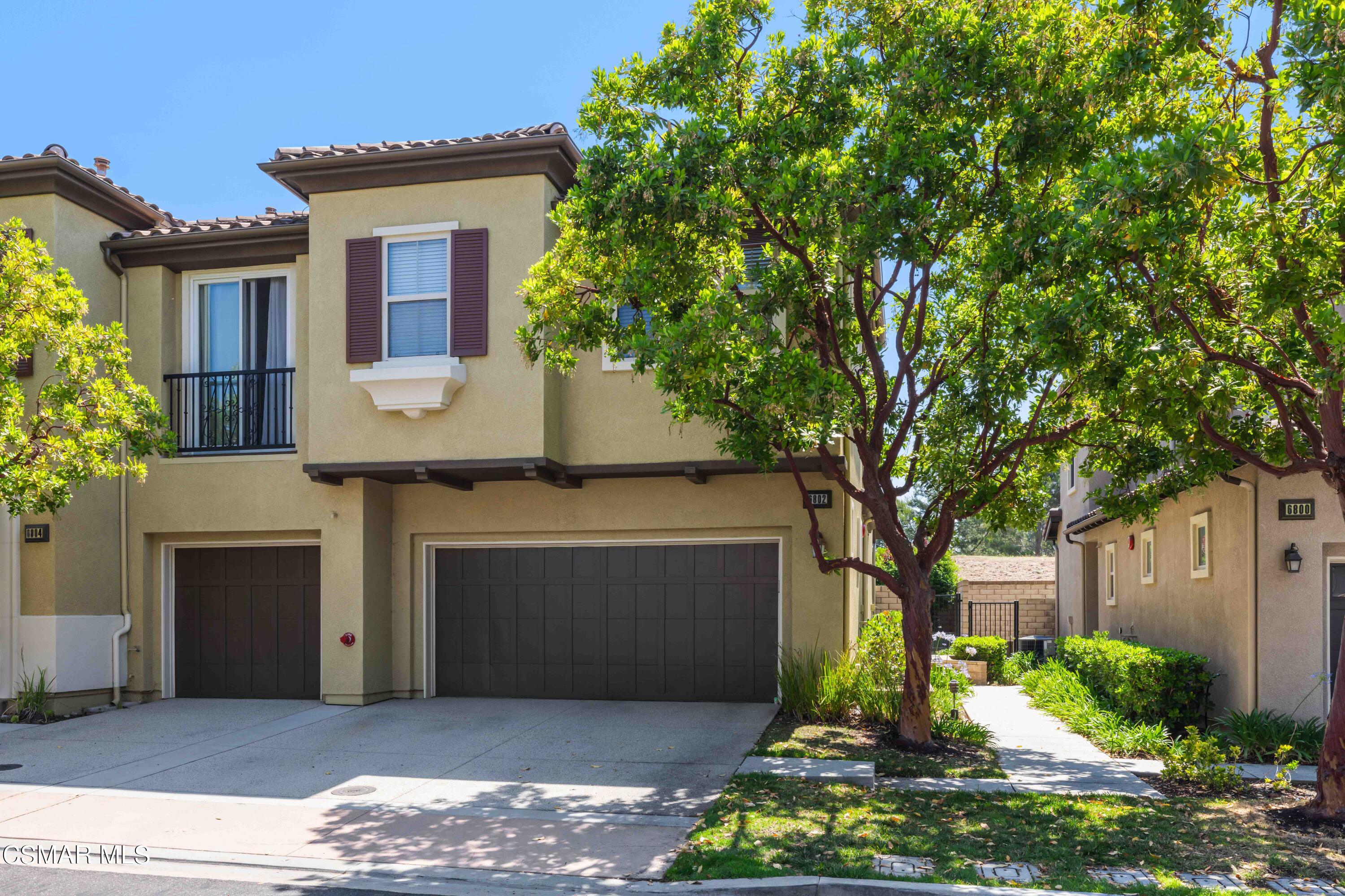 6802 Simmons Way Moorpark, CA 93021 - Photo 29 of 36 a front view of a house with garden