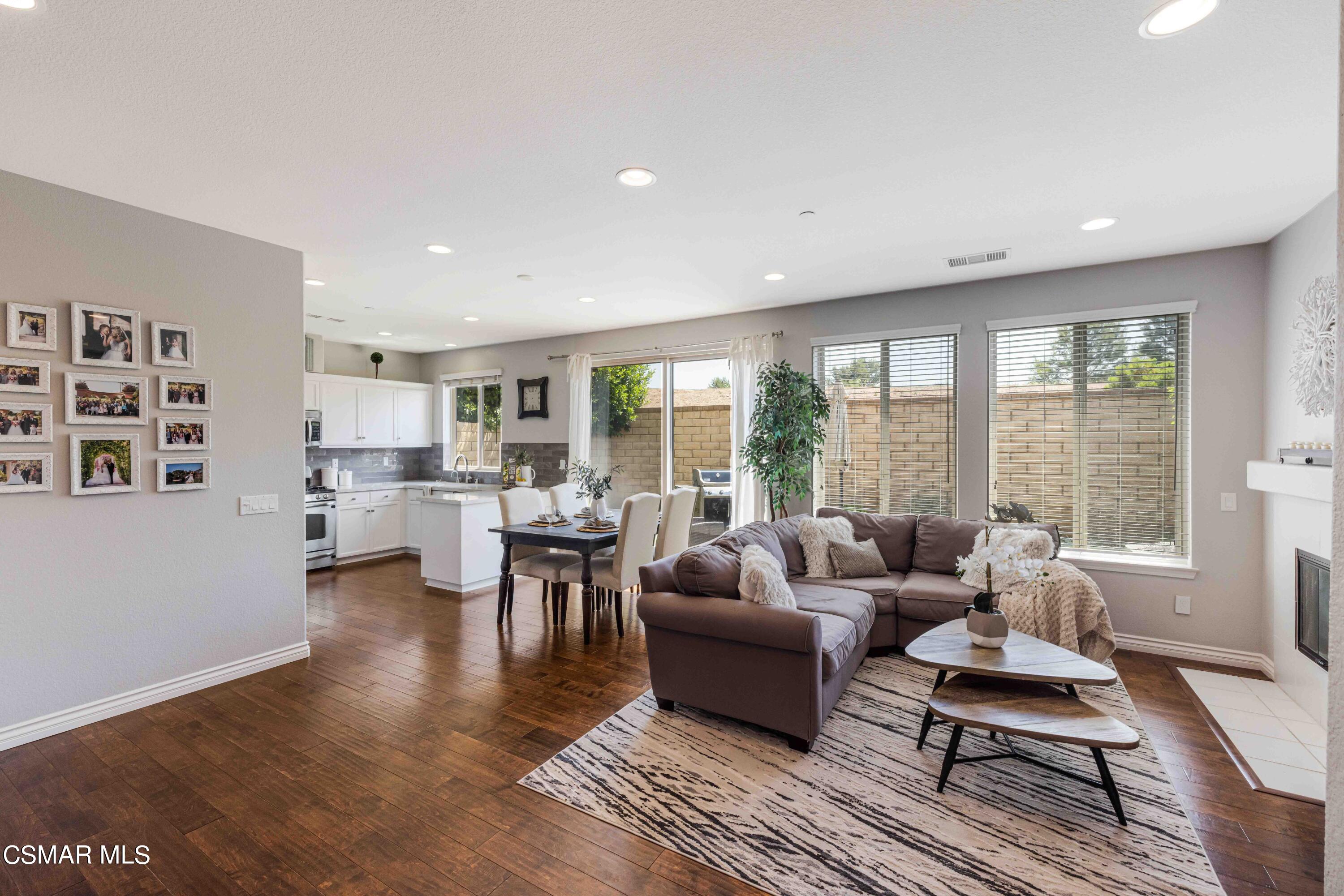 6802 Simmons Way Moorpark, CA 93021 - Photo 4 of 36 a living room with furniture and a table