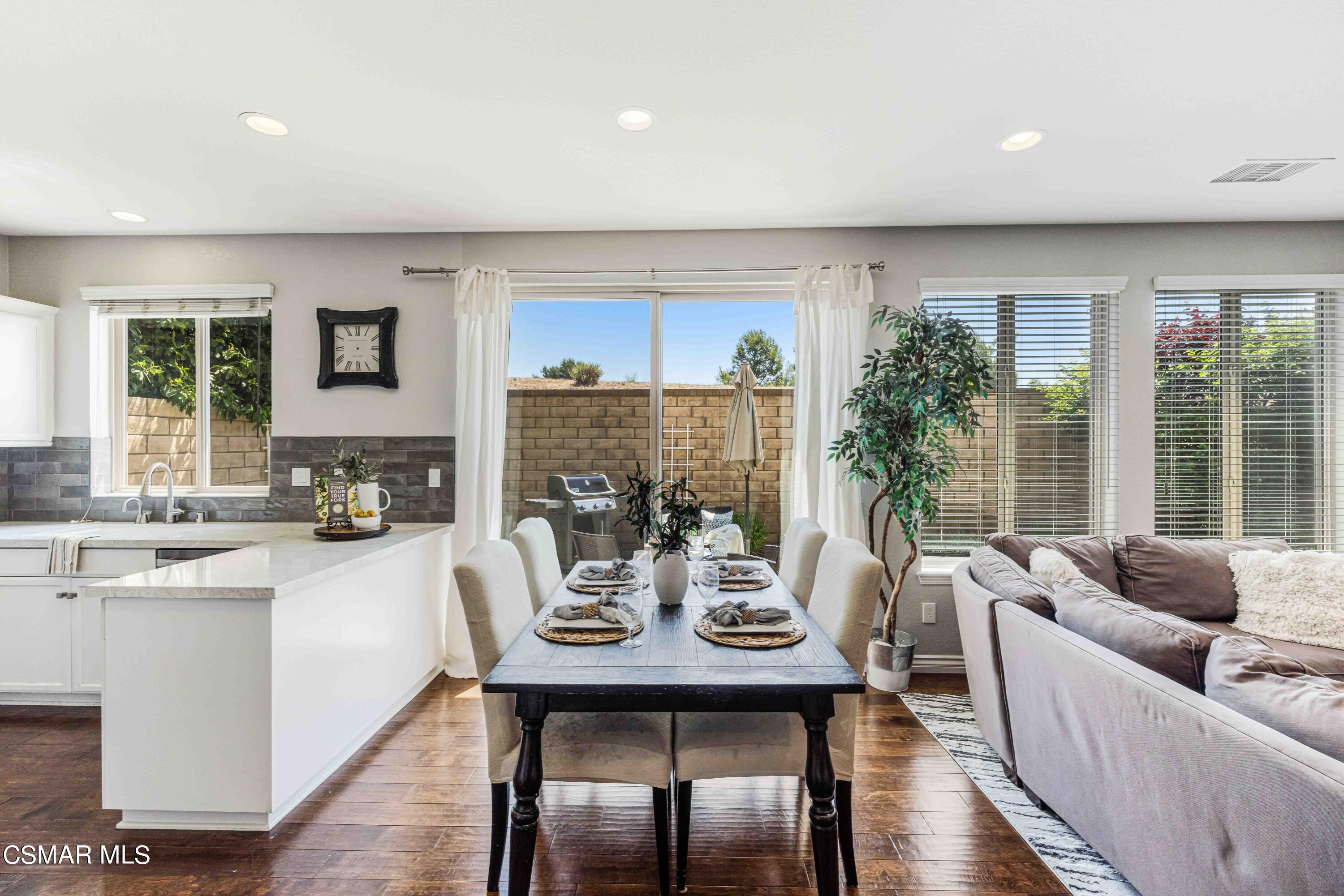 6802 Simmons Way Moorpark, CA 93021 - Photo 7 of 36 a living room with furniture and a large window