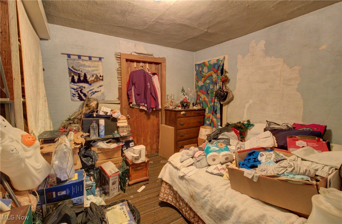 3227 Derussey Road Collins, OH 44826 - Photo 9 of 28 Bedroom with wood finished floors