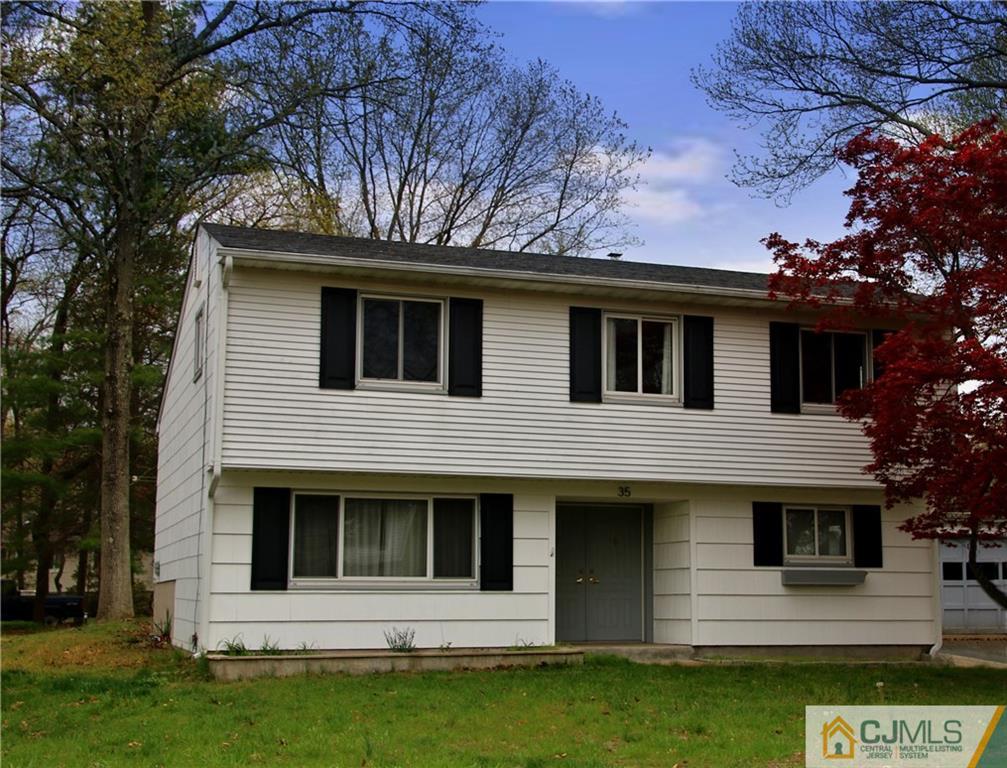 35 Rieder Road Spotswood, NJ 08884 - Photo 2 of 25 a front view of a house with a yard