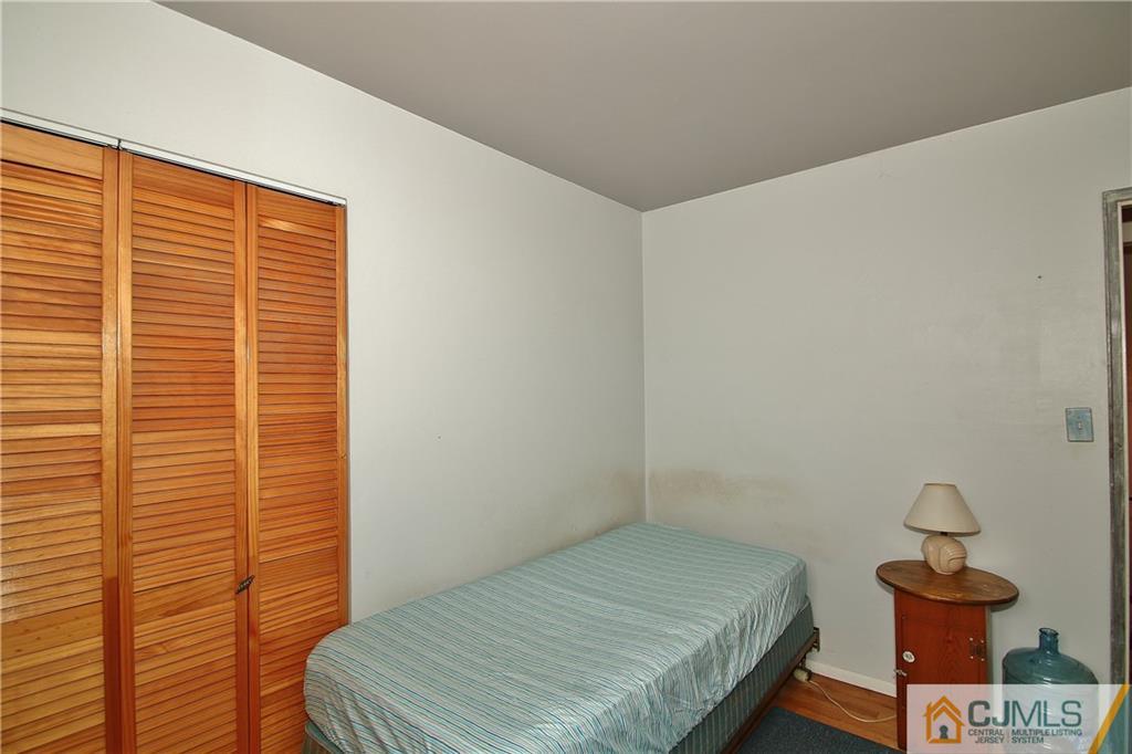35 Rieder Road Spotswood, NJ 08884 - Photo 17 of 25 a bedroom with a bed and a window
