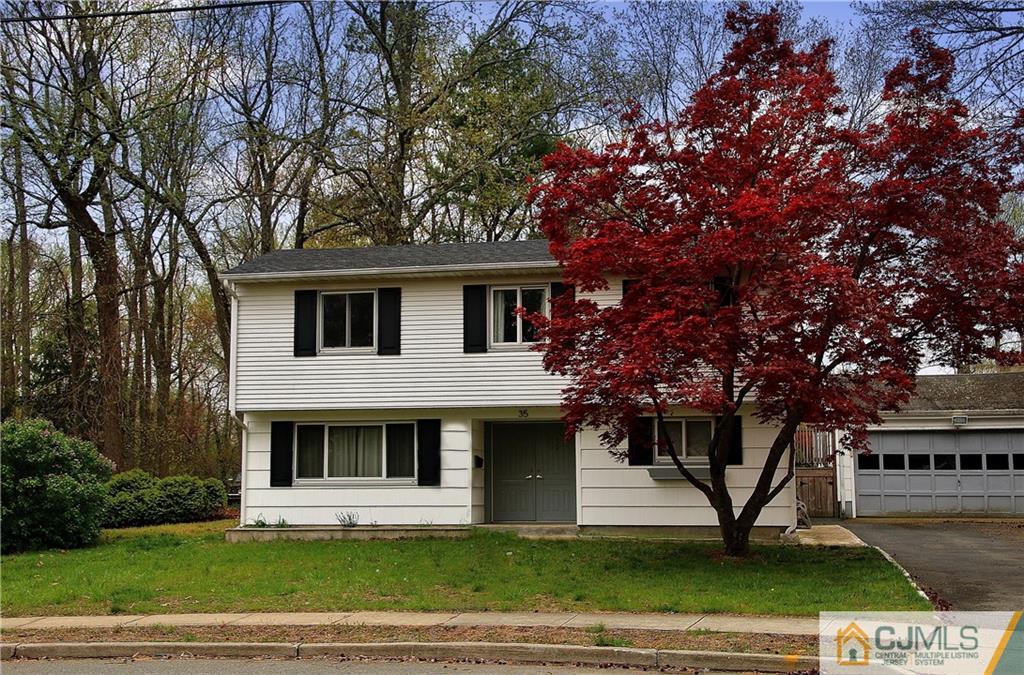 35 Rieder Road Spotswood, NJ 08884 - Photo 3 of 25 a front view of a house with a yard
