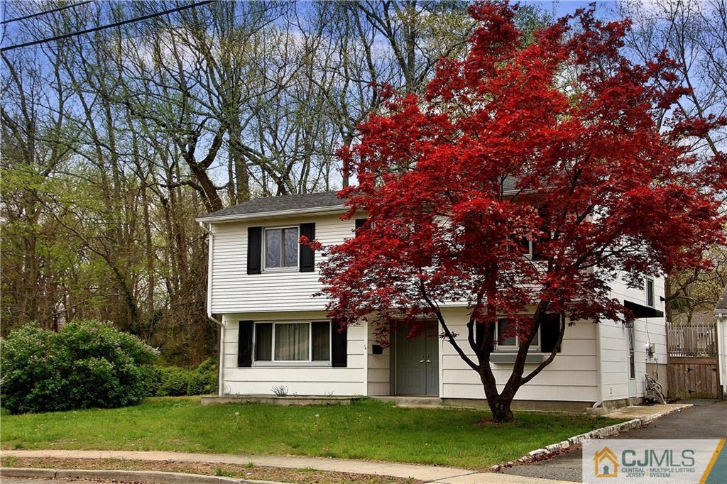 35 Rieder Road Spotswood, NJ 08884 - Photo 4 of 25 a front view of a house with garden