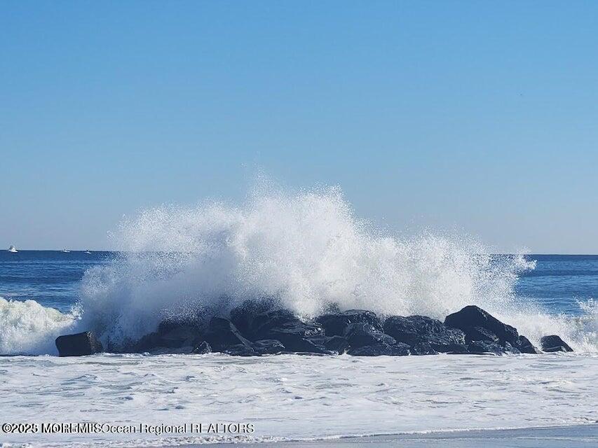 260 Ocean Avenue, Unit A18 Sea Bright, NJ 07760 - Photo 1 of 19 a view of wooden floor in a room
