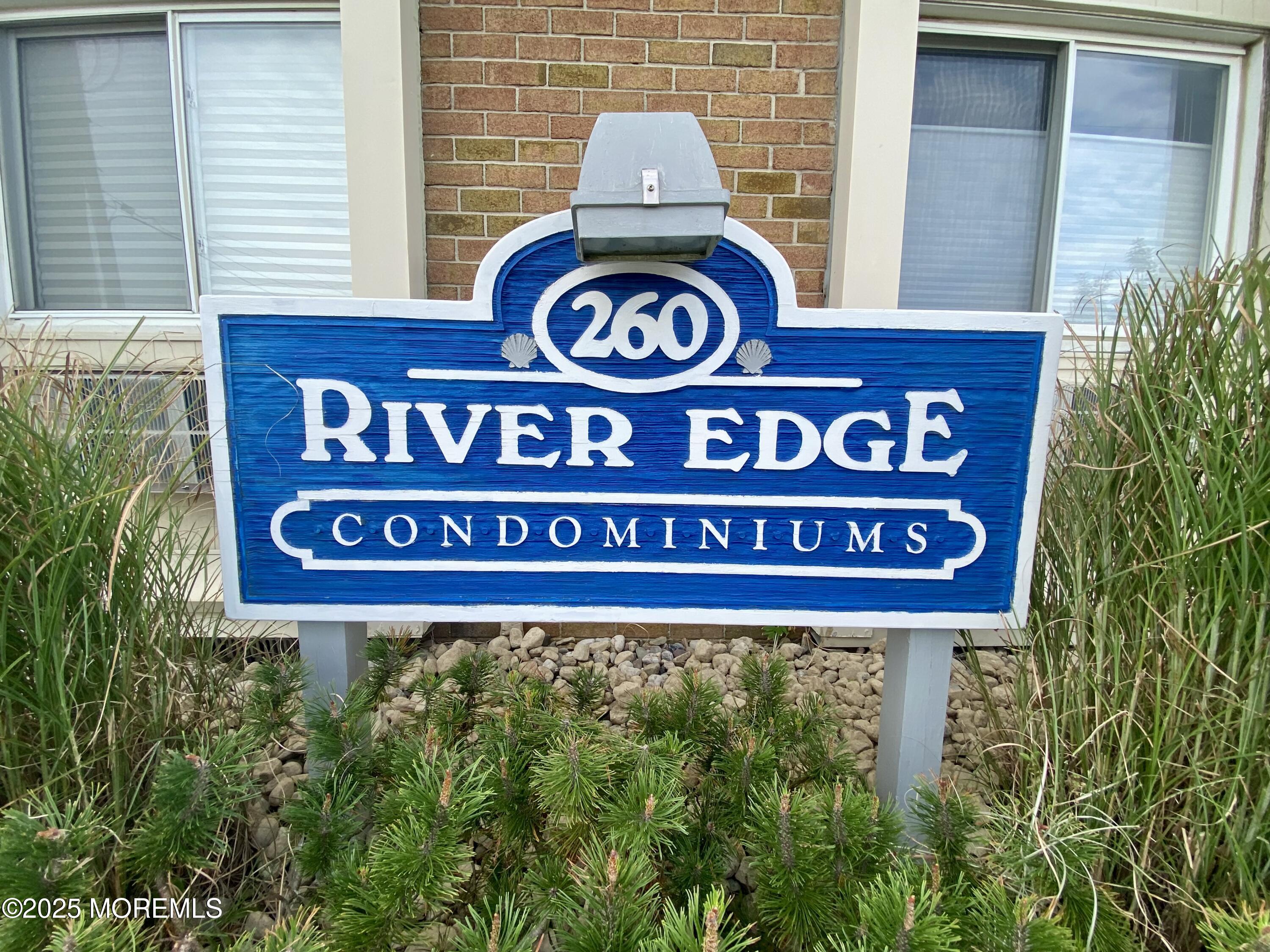 260 Ocean Avenue, Unit A18 Sea Bright, NJ 07760 - Photo 2 of 19 a close up of a street sign