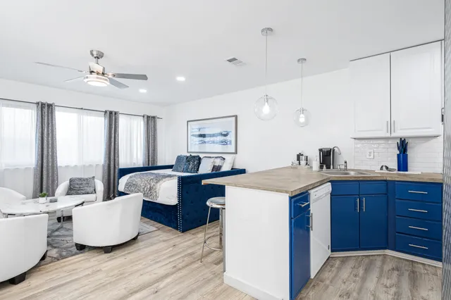 a living room with furniture and a table