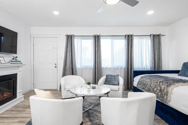 a view of a table and chairs in a room