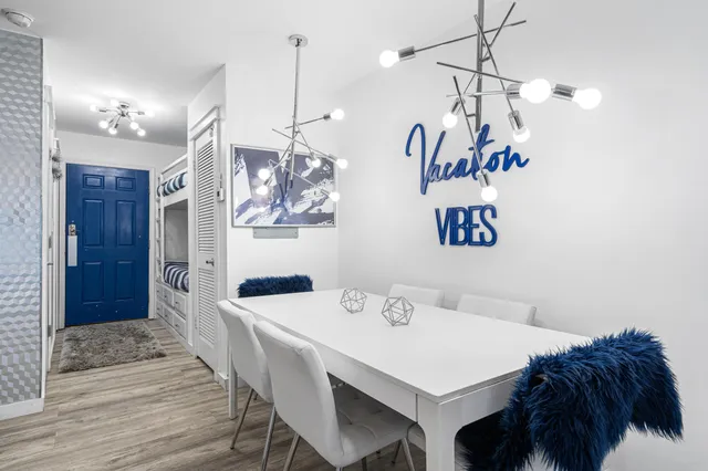 a bedroom with a bed and glass window