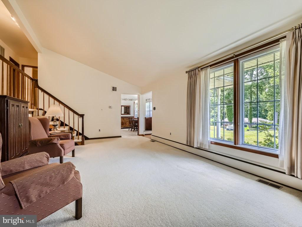 607 Plumtree Road Bel Air, MD 21015 - Photo 7 of 41 Living Room with Vaulted Ceiling and Fireplace