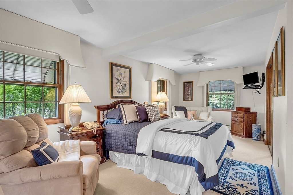 4 Belfast Road Peabody, MA 01960 - Photo 17 of 34 a bed room with a bed and a window
